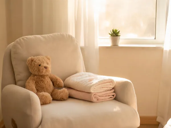 Plush bear on nursery chair